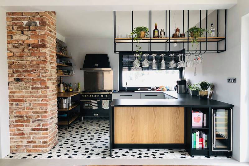 Kitchen with peninsula in country-industrial style